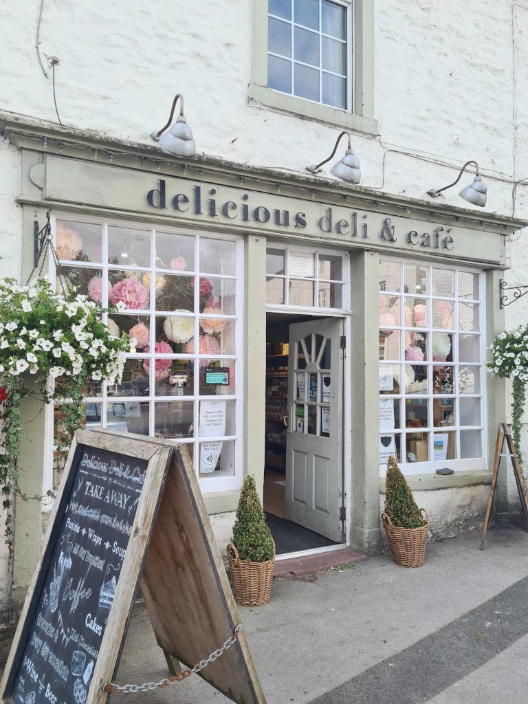 An image of the front of the Delicious Deli and Cafe