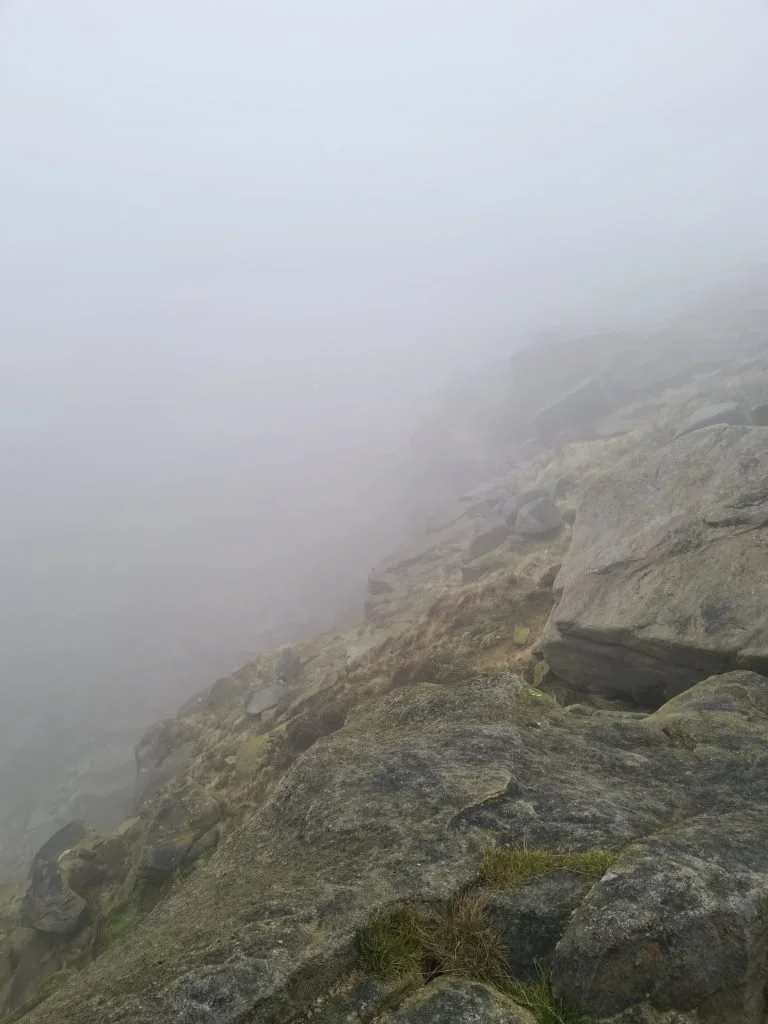 Top of Kinder Downfall in the mist