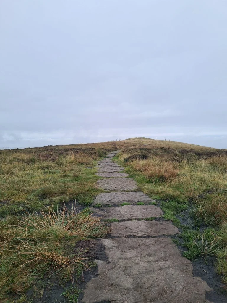 Pennine Way leading to burial barrow on Kinderlow