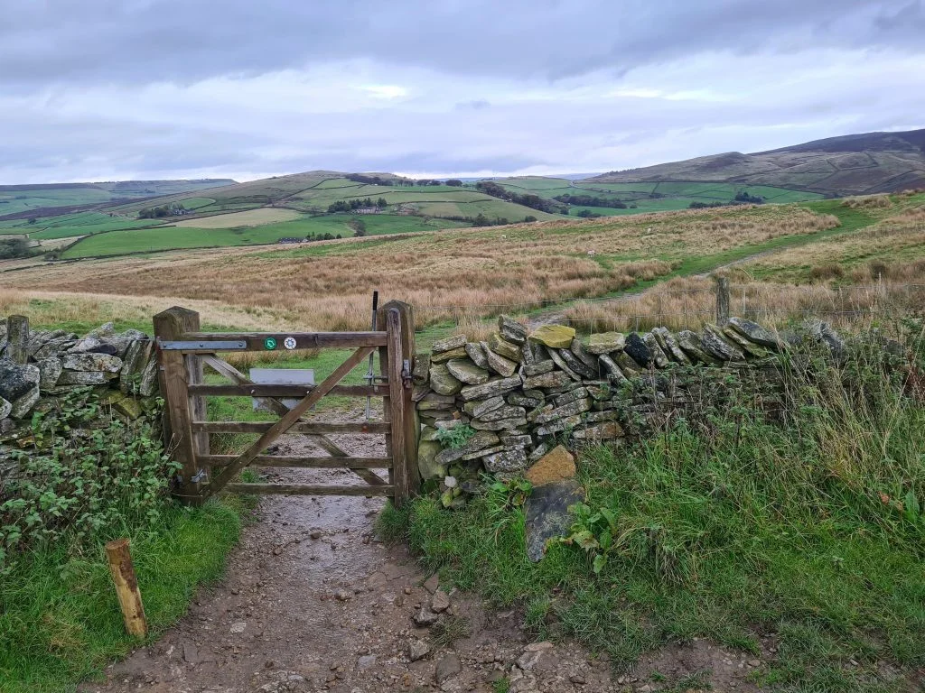 Wooden gateway to farmland in Derbyshire