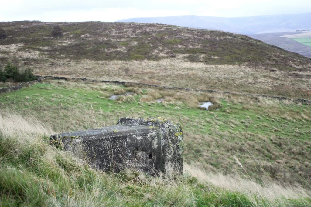 The fallen Lantern Pike trig point with a view over to Lantern Pike hill - The Wandering Wildflower