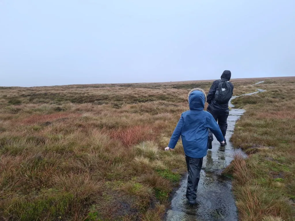 Walking along the Pennine Way on Ashop Moor to Featherbed Top