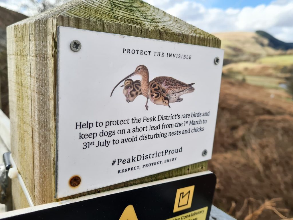 A sign asking dog owners to keep their dogs on a lead between 1 March and 31 July to protect rare nesting birds