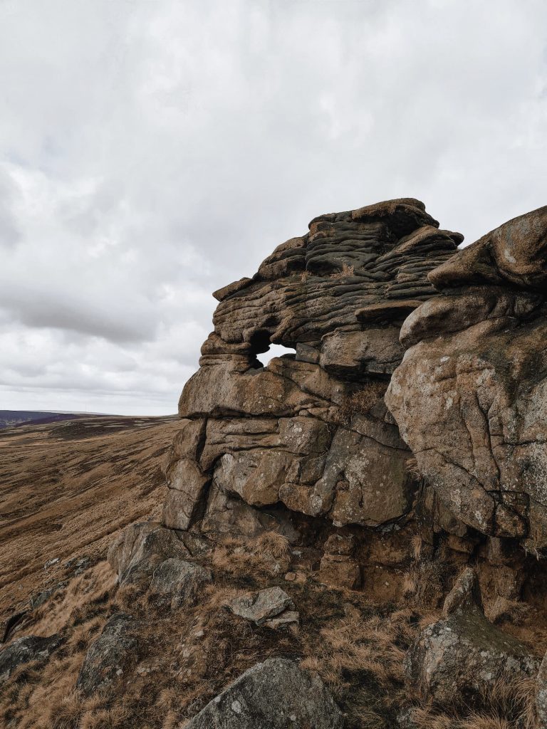 Rock formations with a natural archway on Howden Edge - Langsett to Margery Hill trig point walk by The Wandering Wildflower