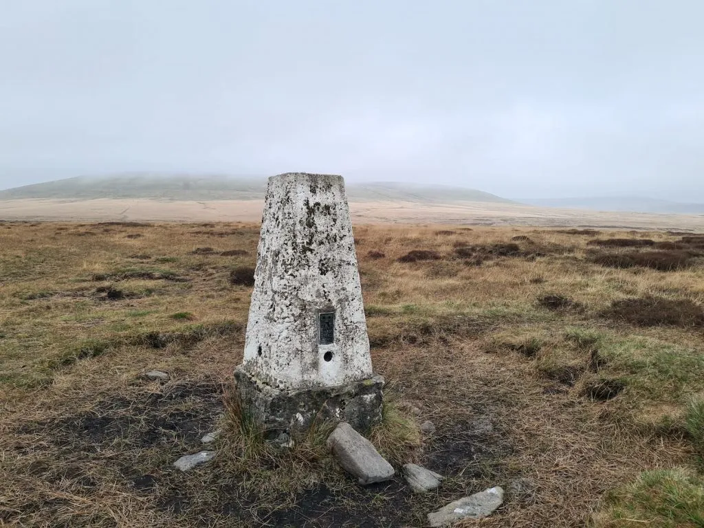 Hey Edge trig point, looking very bleak in the wet mist
