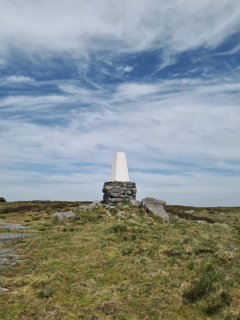 The Edge trig point, with the fallen trig on the ground next to the upright one