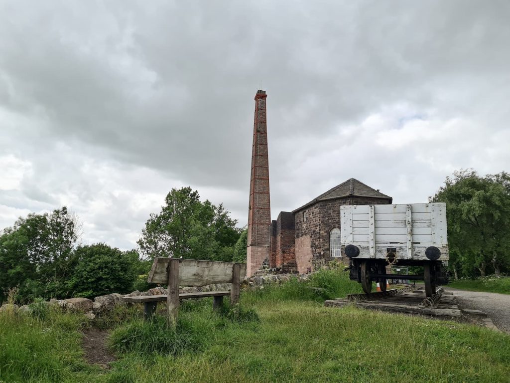 Middleton Top Engine House with it's chimney and an old railway wagon
