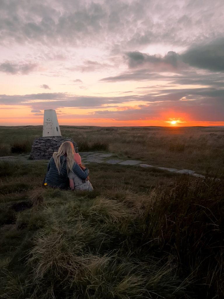 Black Hill trig point at sunset - The Wandering Wildflower