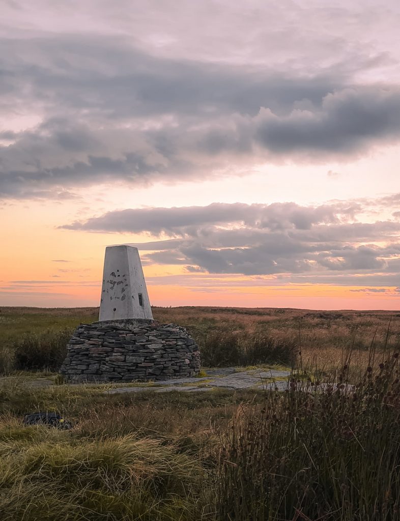 Black Hill trig point at sunset - The Wandering Wildflower