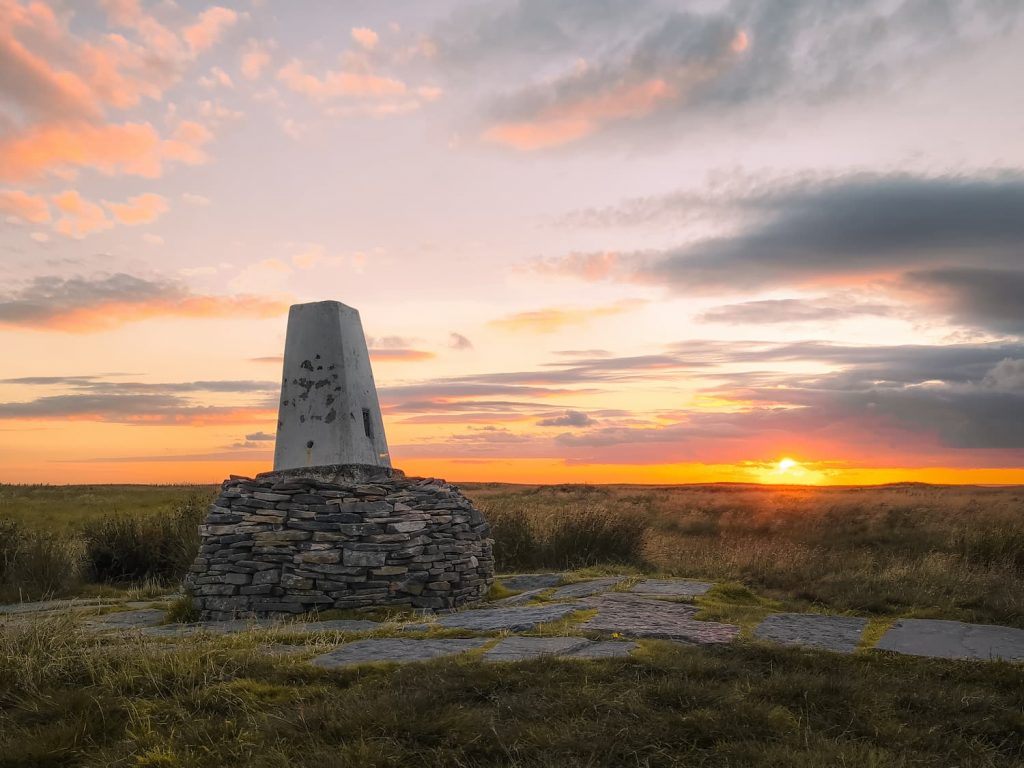 Black Hill trig point at sunset - The Wandering Wildflower