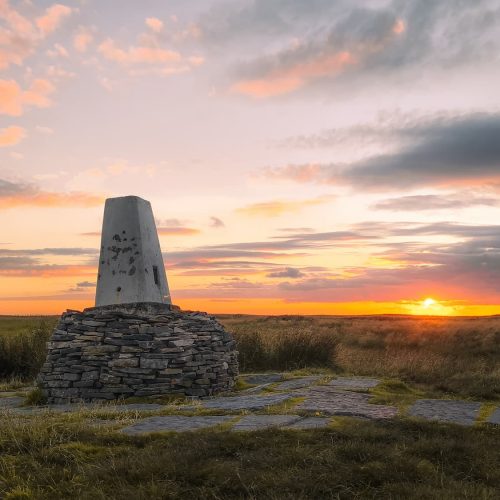 Black Hill trig point at sunset - The Wandering Wildflower