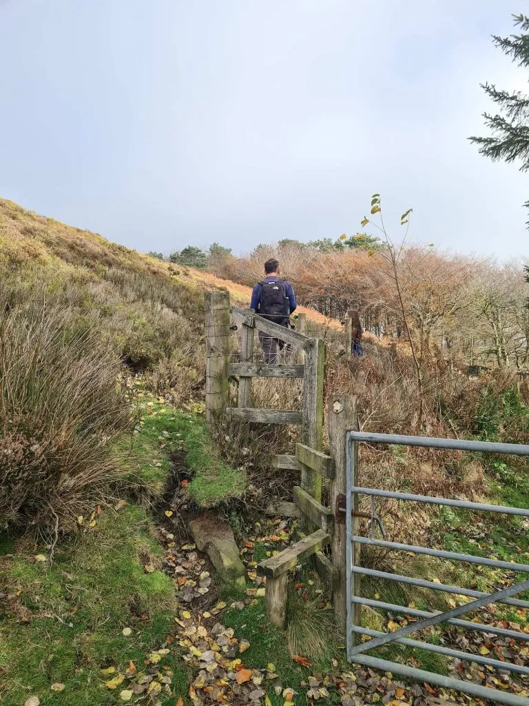 A man and his daughter walking on the moors above Sheffield