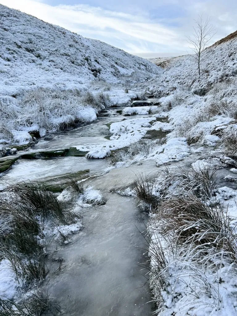 A frozen Dean Clough near Black Hill