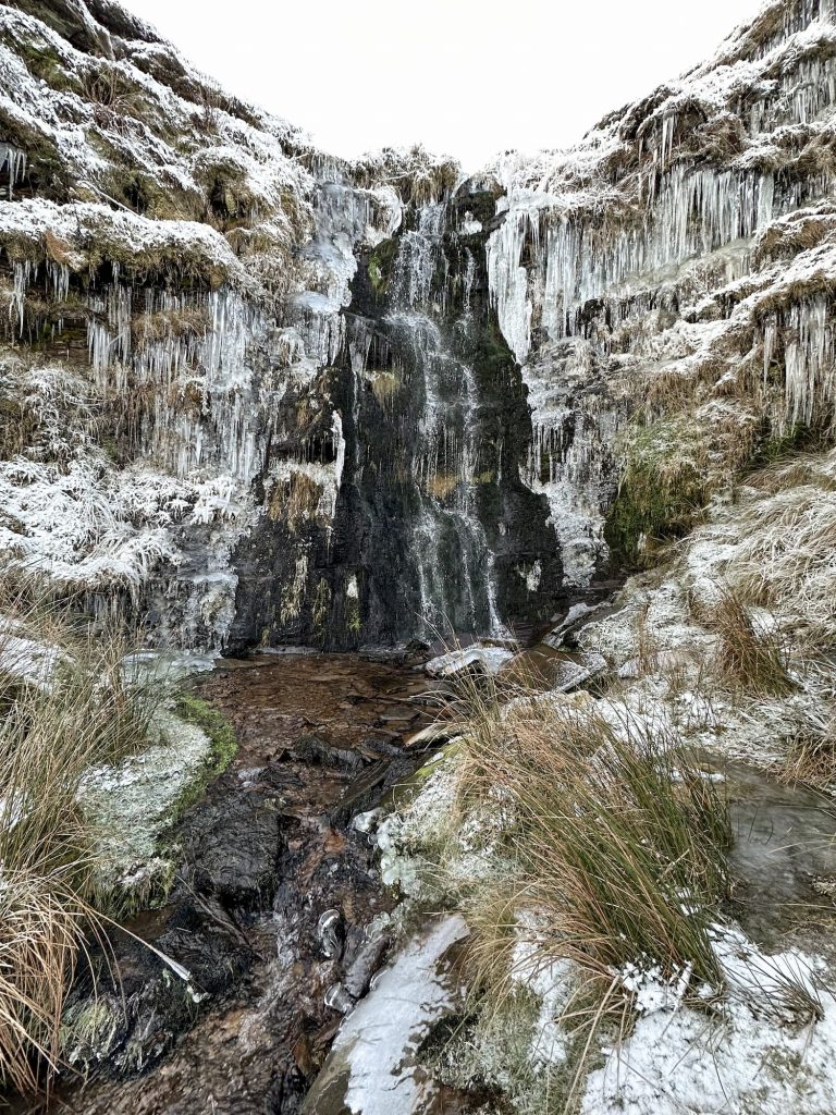 A frozen Issue Clough waterfall near Black Hill