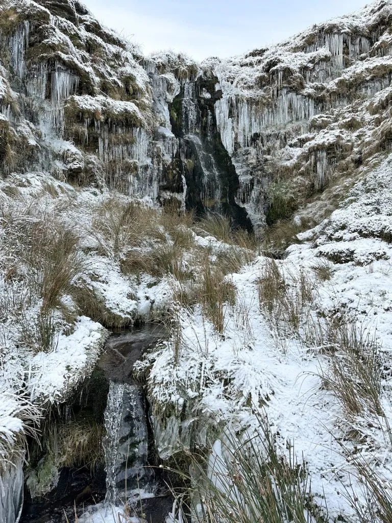A frozen Issue Clough waterfall near Black Hill