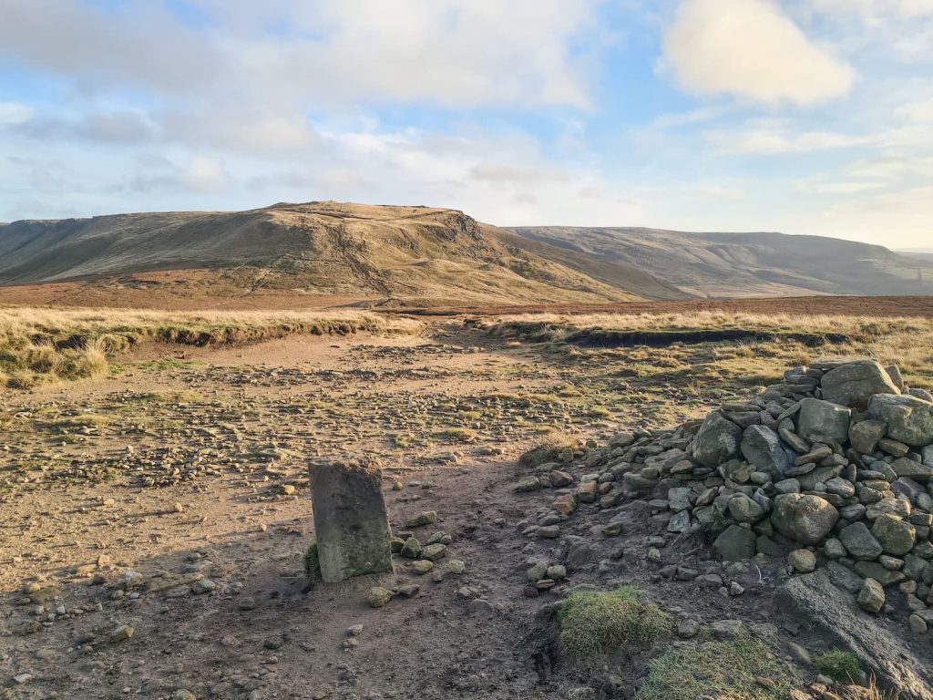Kinderlow End as seen from Mill Hill summit, marked with a stone cairn