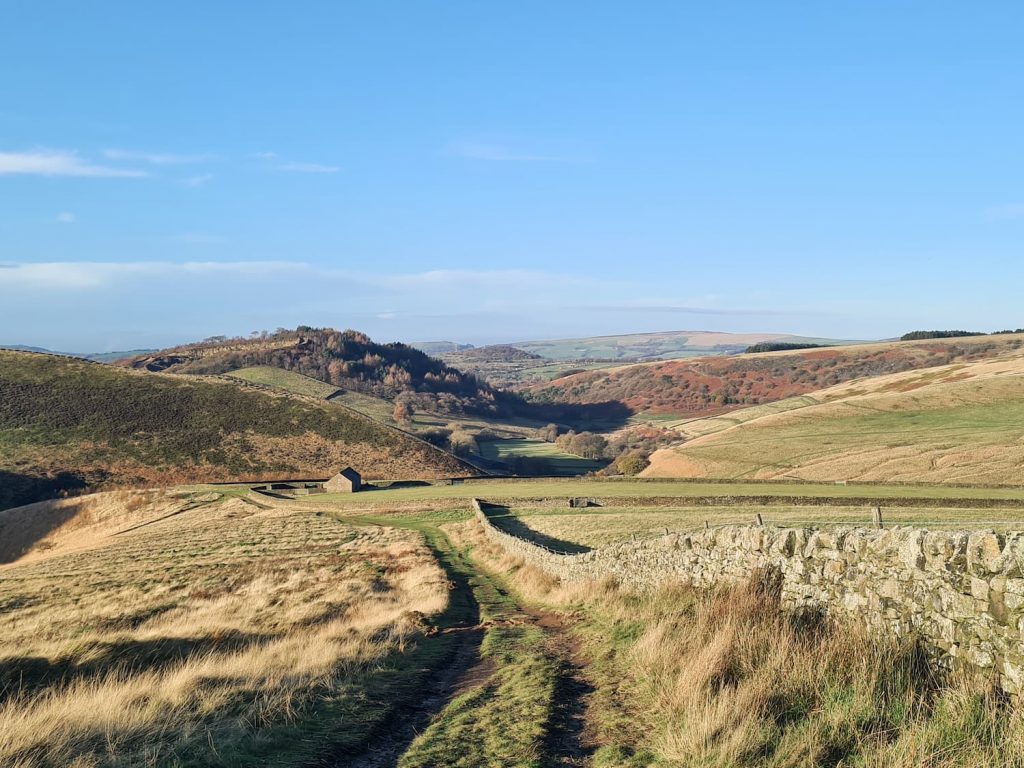 View down towards Glossop from the path to Lower Shelf Stones