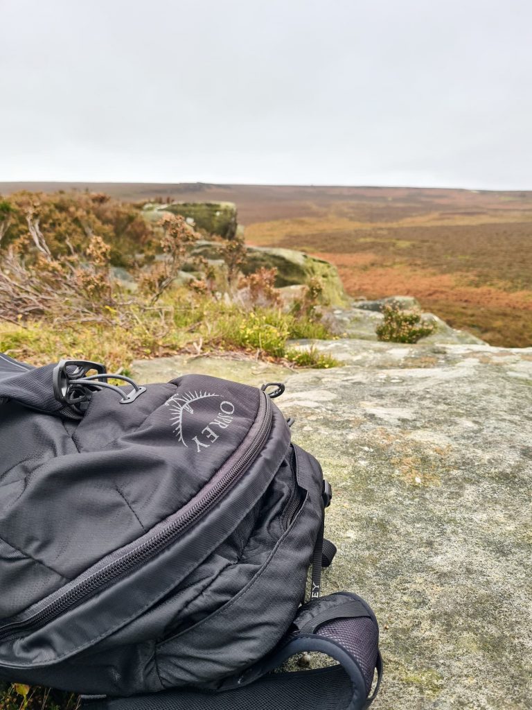 An Osprey rucksack and a moorland view