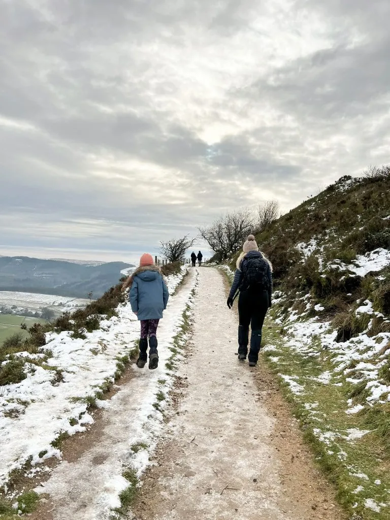 A woman and her daughter walking in Teggs Nose Country Park