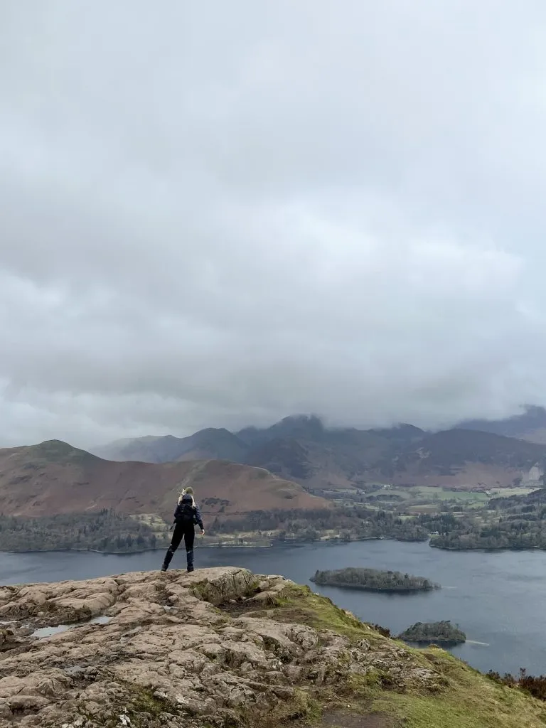 A woman admiring the view over Derwentwater from Walla Crag