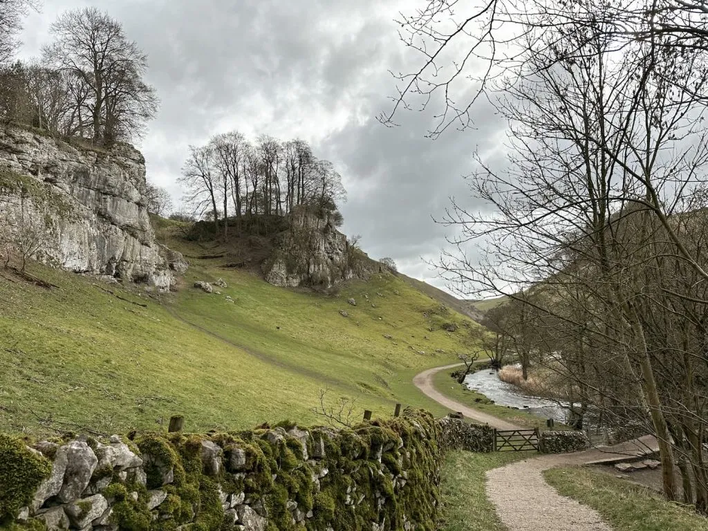 Steep limestone outcrops in Wolfscote Dale
