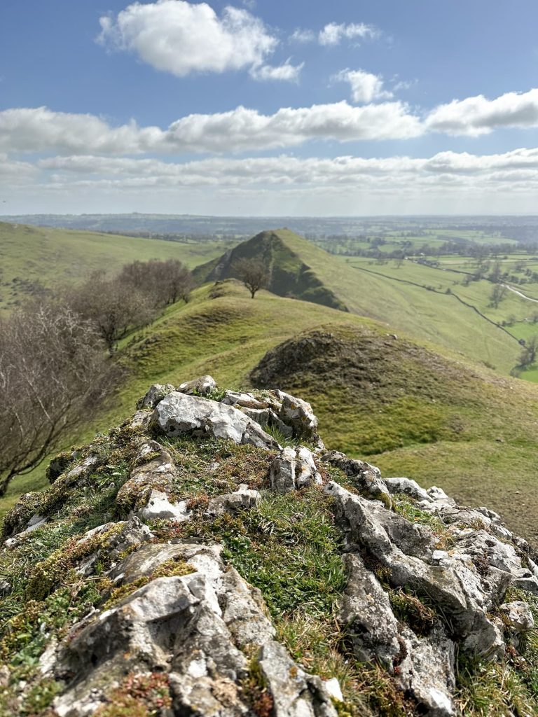 A view of Thorpe Cloud from Bunster Hill with a limestone outcrop