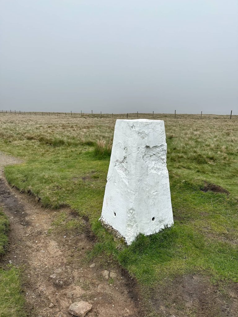 White Hill trig point, a white painted concrete pillar