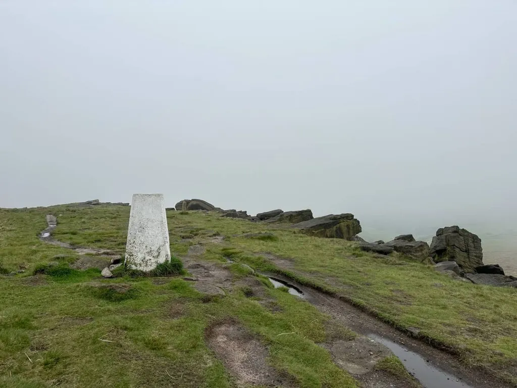 Millstone Edge trig point, a white painted concrete pillar