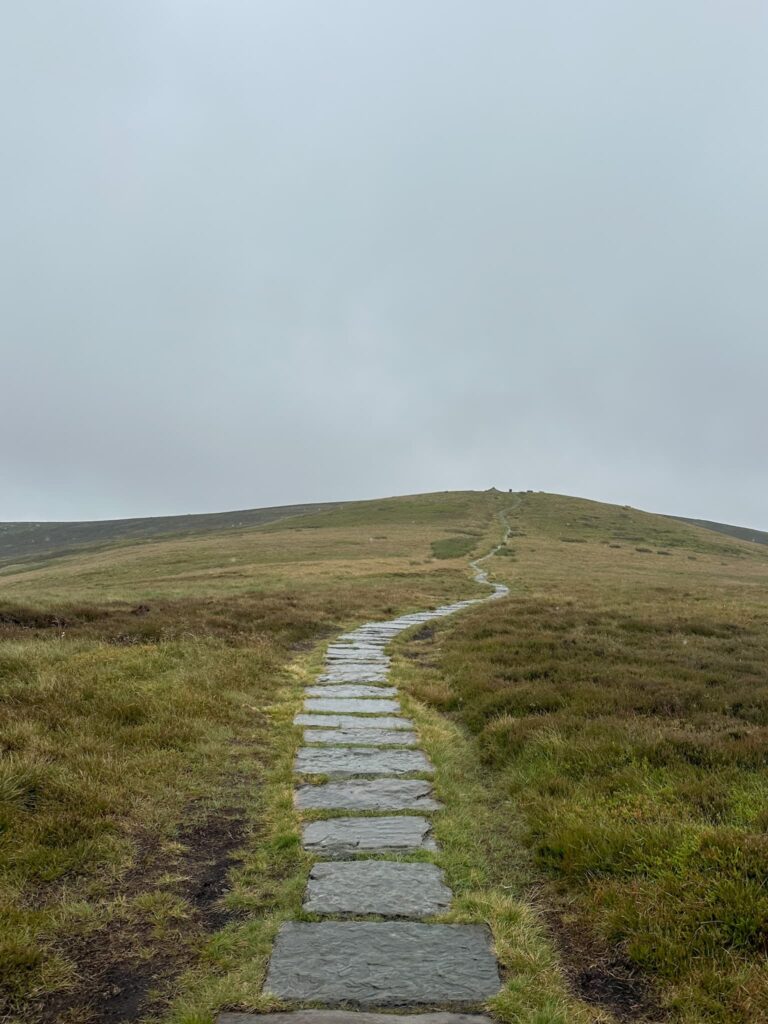 A stone flagged path on the moor leading to Lost Lad