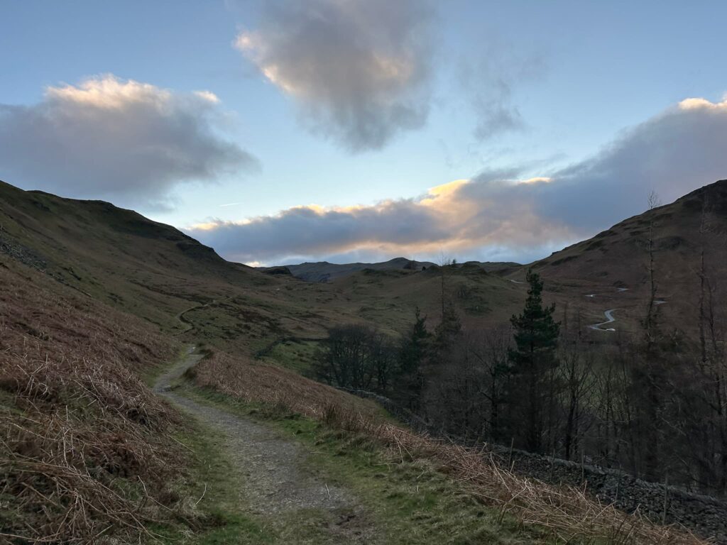 A track in the Lake District with the light fading at the end of the day