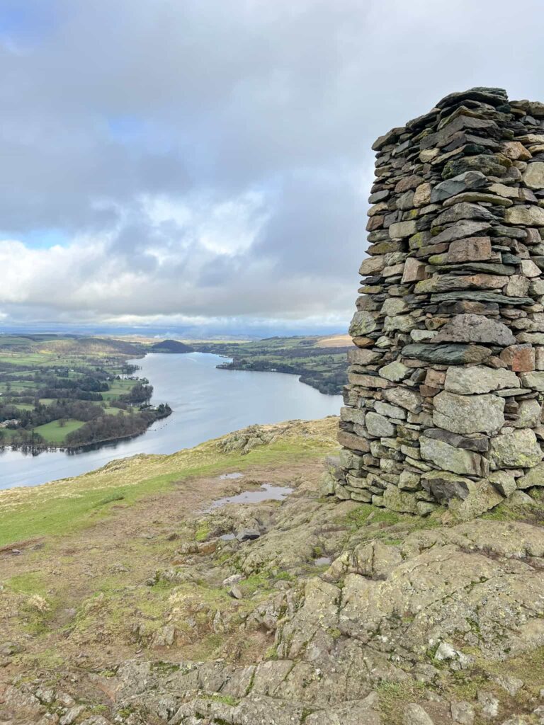 A view from Hallin Fell summit with the large stone obelisk