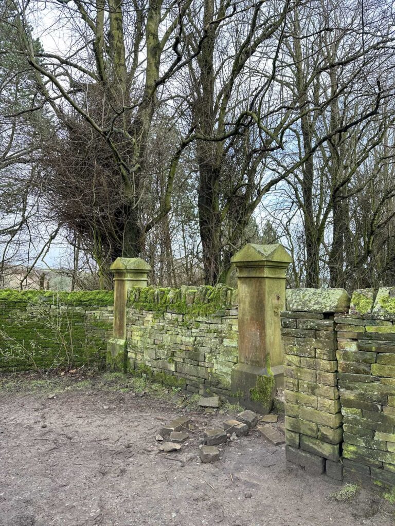 Some gateposts for a former Victorian mansion. The gate opening has been walled up