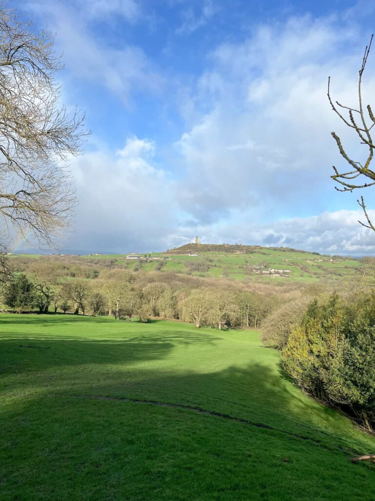 A view of Castle Hill from Farnley Tyas - green fields and blue skies
