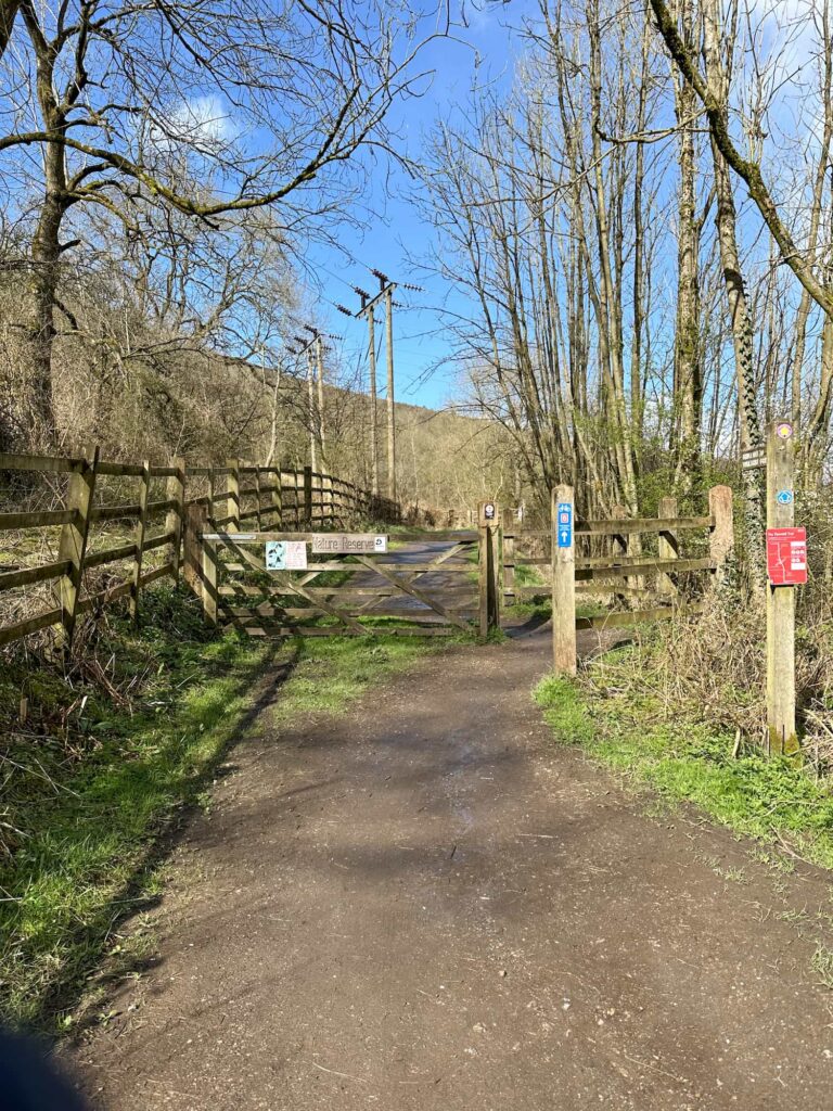 A wooden gate leading to the Thornhill Carrs Trail