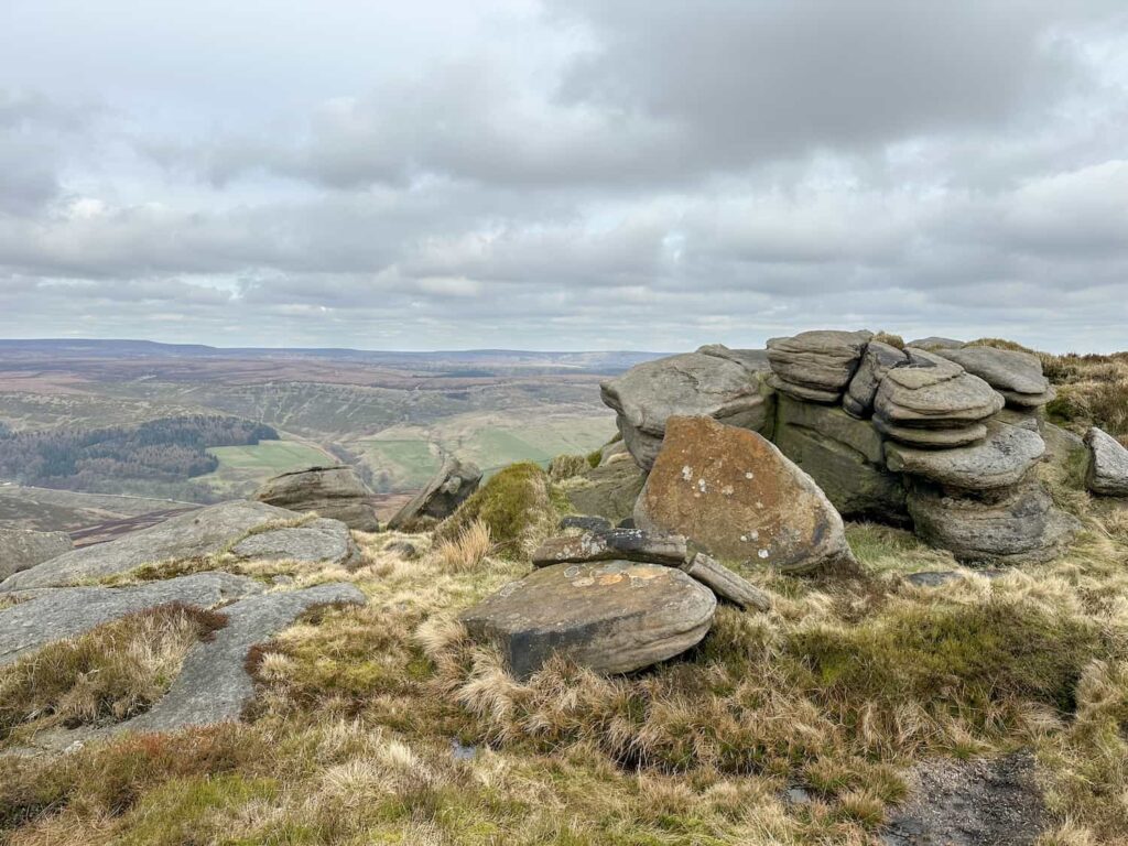 A gritstone rock formation at the top of Blackden Brook