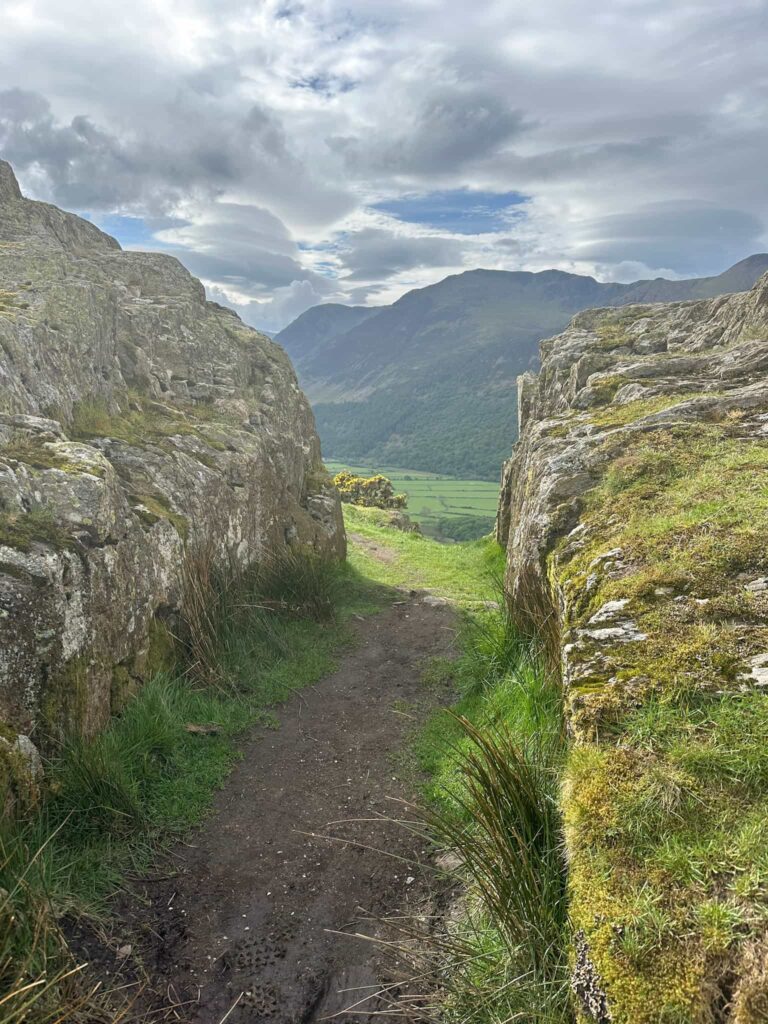 A gap in the rocks leading to the summit of Rannerdale Knotts