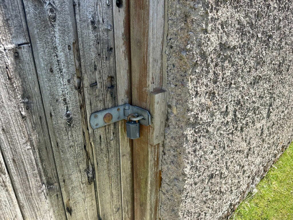 The locked door of Jubilee Hut