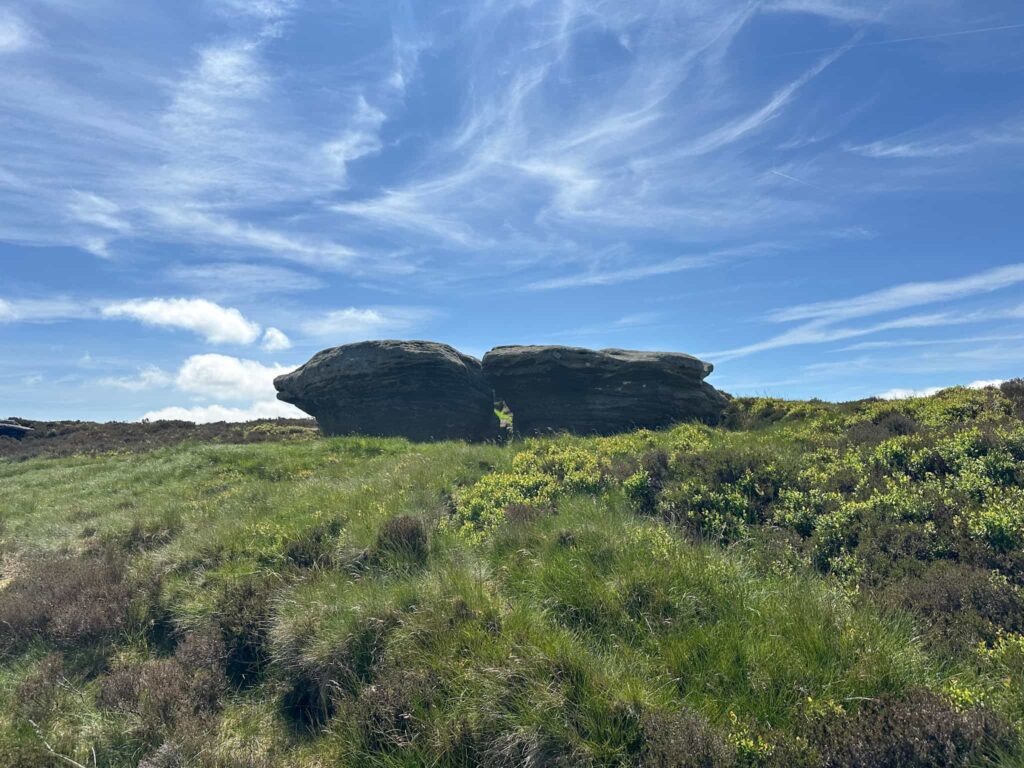 A large rock formation on Kinder Scout