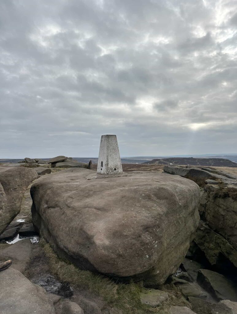 White Path Moss trig point on a rock