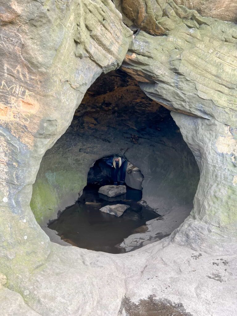 A woman in a cave