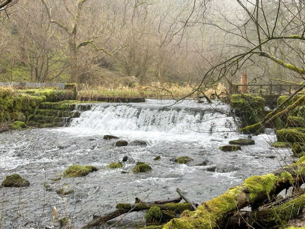 A weir in the River Lathkill