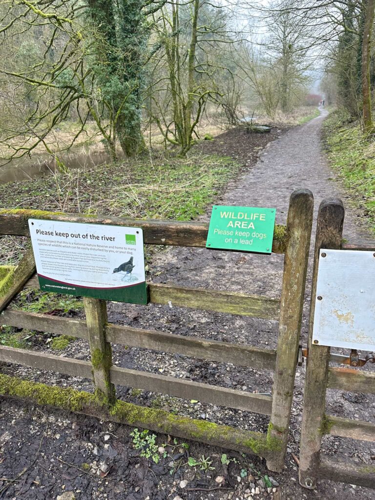 Notices on the entrance to Lathkill Dale