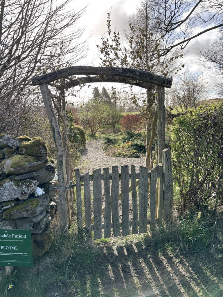 Wooden gate leading into Mungrisdale Pinfold