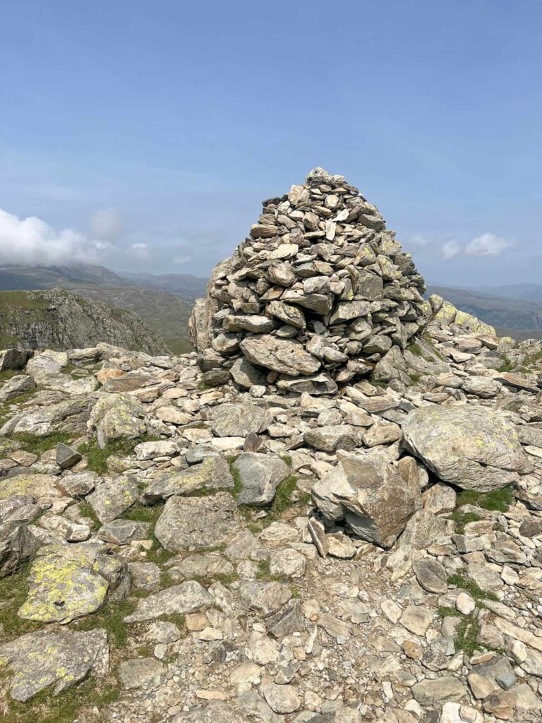 Swirl Hows summit cairn