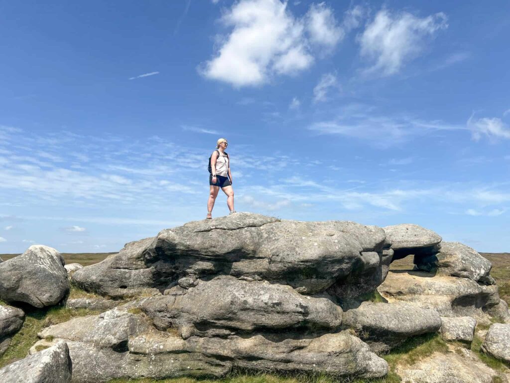 A woman walking on a rock