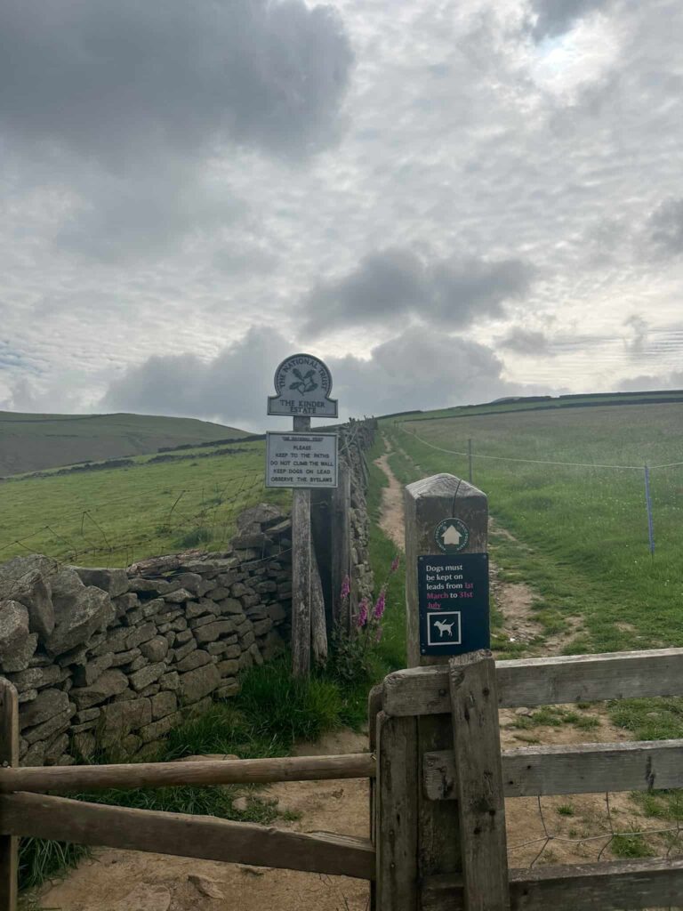 A sign advising dogs on leads