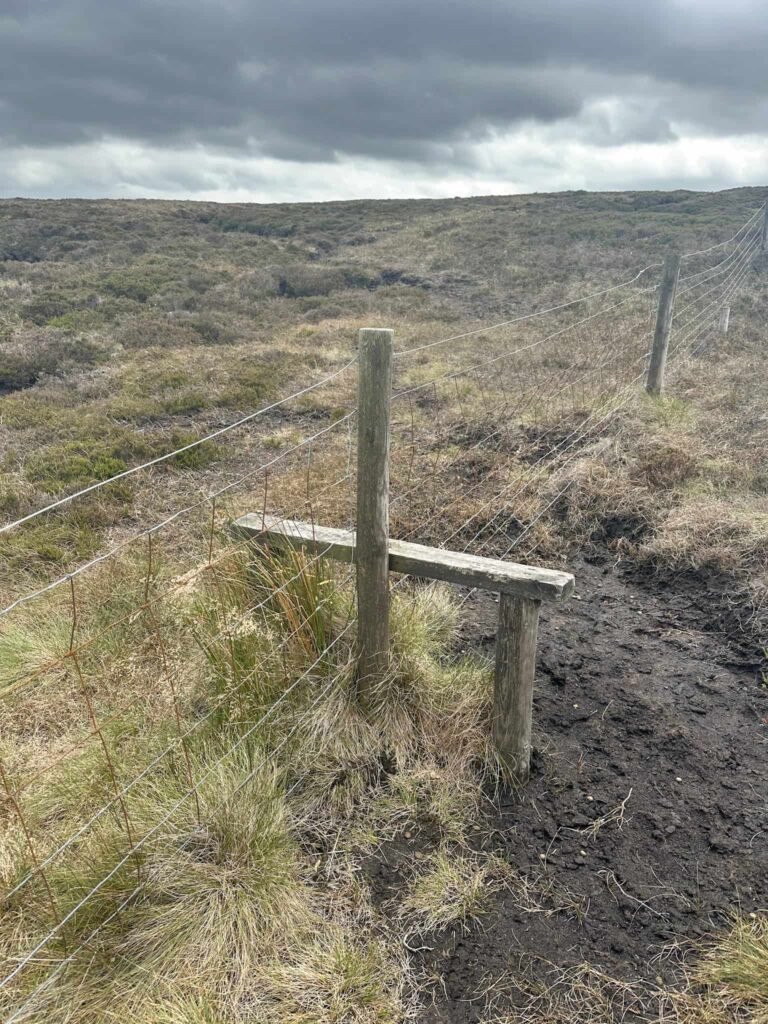 A stile over a fence