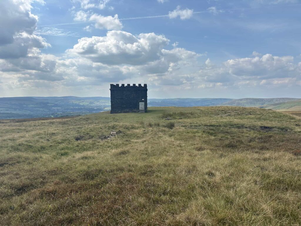 Cowburn Tunnel Shaft, a small castle-like structure on the moors