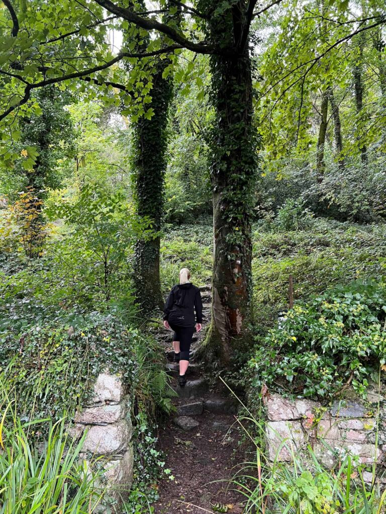 A woman walking up some steps