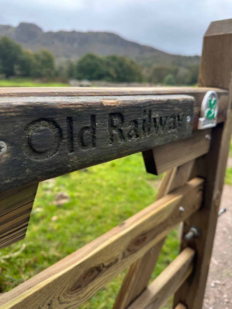 A wooden gateway for an Old Railway